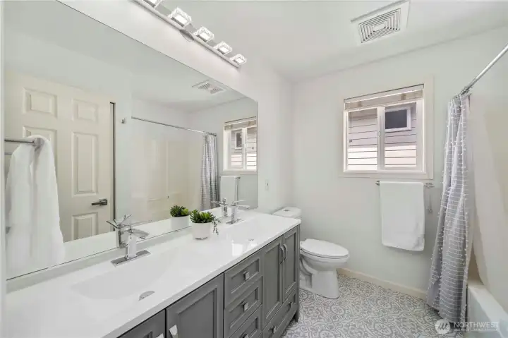 Totally upstated 2nd bathroom upstairs with double vanities