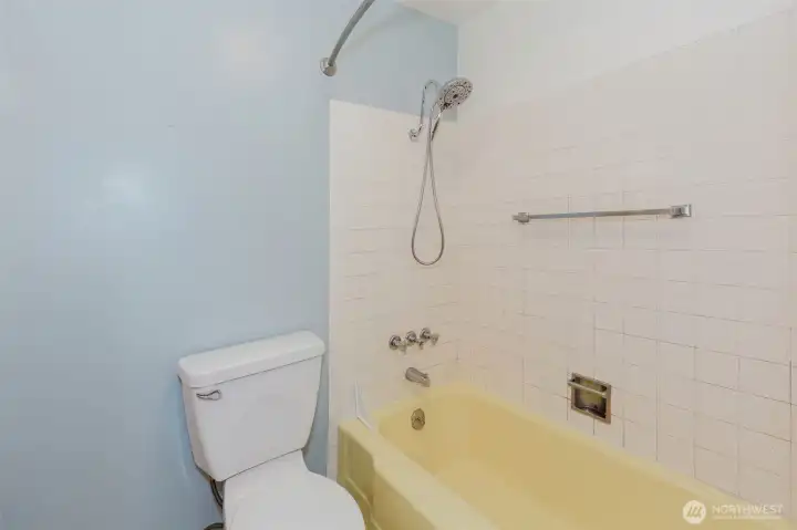 Main bath featuring tub/shower combination.