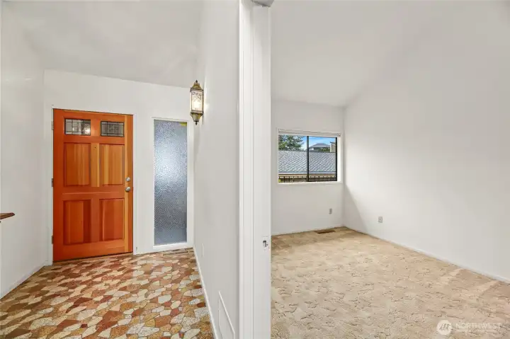 Vaulted ceiling entry  Coat and linen hall closets, plus 3rd closet is location of furnace