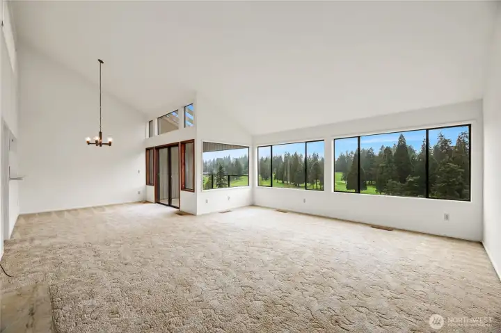 GREAT ROOM  Covered deck and wall of windows overlooks AMAZING golf course   views of holes #7, 8 & 9