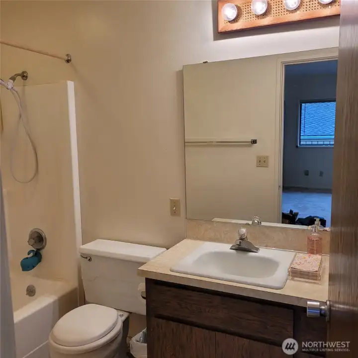 Primary Suite - attached full bathroom with single vanity