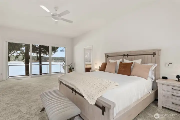 Primary Bedroom features private balcony. New Carpet.