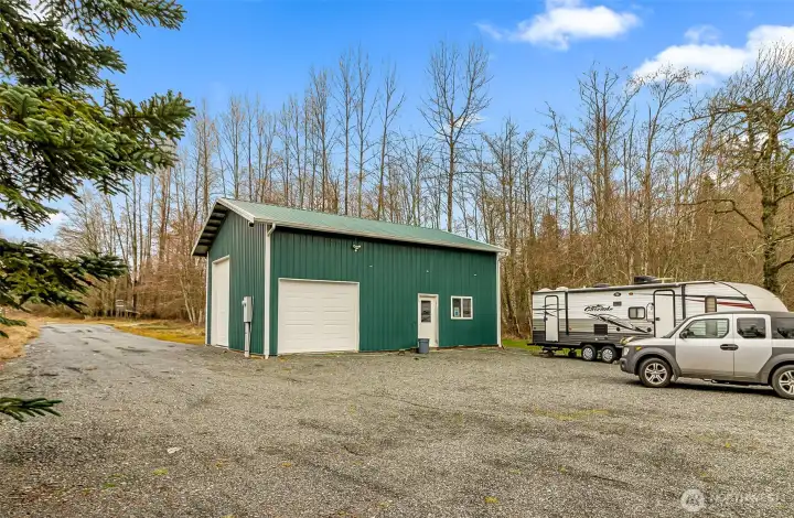 Large multi purpose garage.  Electric and Insulated.