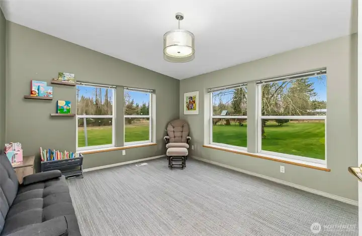 Family room with a nice view of the property.