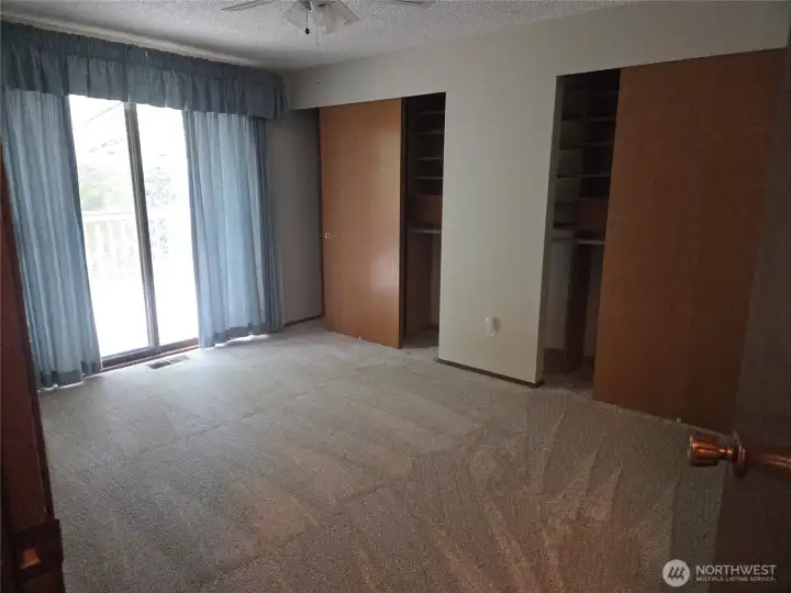 Primary Bedroom with his and hers closets