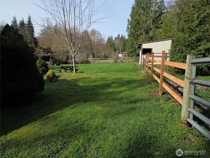 There is a horse stall in addition to the barn