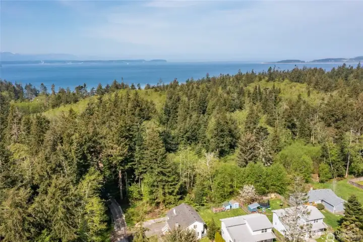 Expansive wooded setting with sweeping water views, offering a rare opportunity to build your private island retreat just moments from the shoreline.