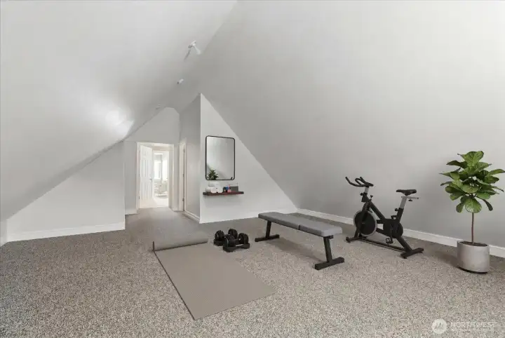 Virtually Staged - idea for use of room above garage.