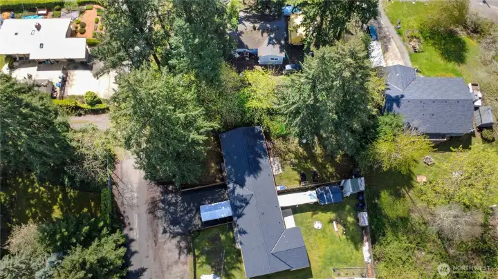 Lot extends beyond fence to the right, approximately 55x114’. Upside to build a townhouse style or garages.  Check with planning & zoning. Easement on record.  see title and plat map.