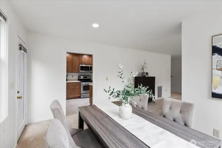 Dining room leading to kitchen