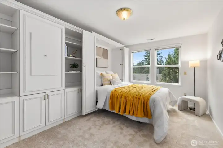 2nd bedroom on other side of house with built ins and Murphy bed