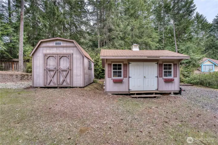 two well maintained outbuildings - garden and workshop