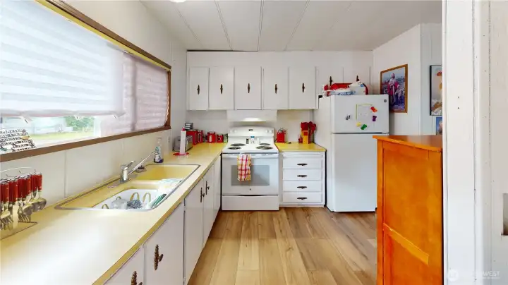 Additional view of the kitchen.