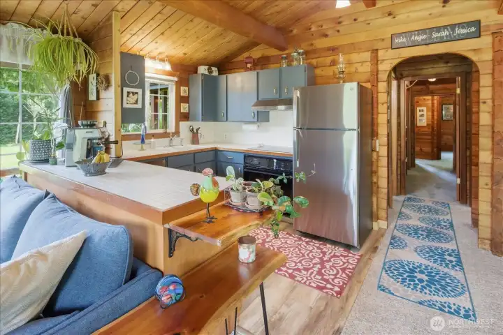 Open kitchen with newer range & hood Open kitchen with newer range & hood
