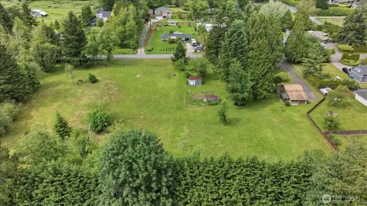 Property lines are the treeline, road, and fence near the right side of the photo Property lines are the treeline, road, and fence near the right side of the photo