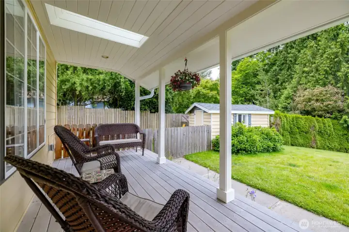 The covered front porch even has skylights to let natural light onto the porch.
