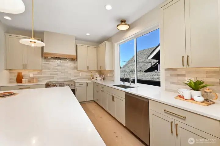 Very well lit and spacious kitchen. Engineered wide plank oak floors throughout this level.