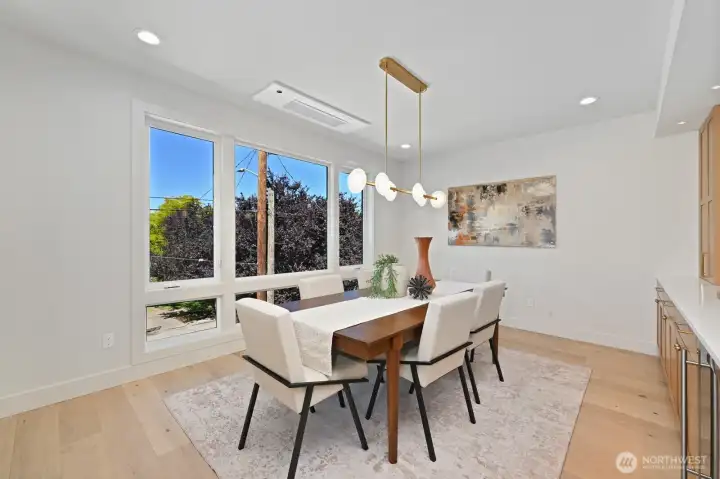 The spacious dining room has space for a large table for up to 10 chairs