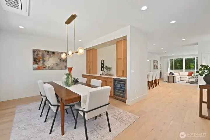 Host formal or holiday diners in the spacious dining room which features beautiful built in cabinets and wine refrigerator