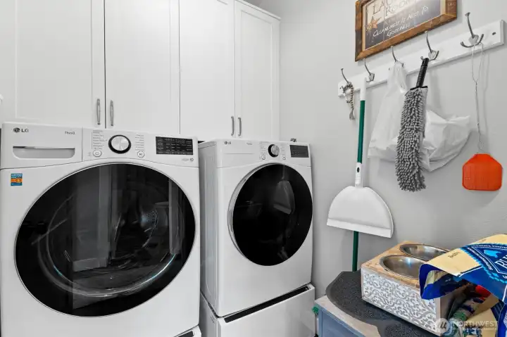 Utilty room, with washer and dryer staying.