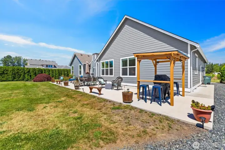 Upgraded new concrete patio area with room for large group entertaining and grilling station.