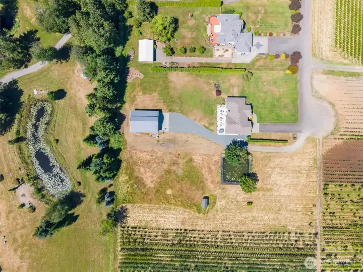 View of the property, view of the well house (shared well with next door neighbor) Water pond for the fire hydrant.