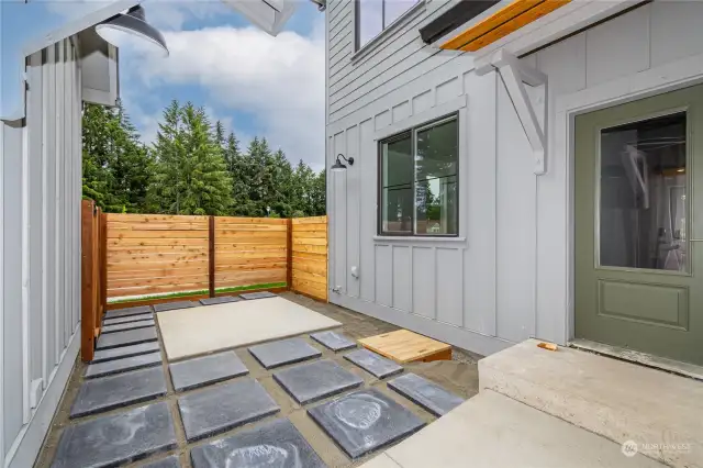 Enjoy quiet relaxation in the private, no maintenance Courtyard, situated between your home and the Garage. This space features gravel & pavers for flexibility in use and a gas tap for convenient grilling or personal firepit. Oversized 2-Car Garage is to the left.