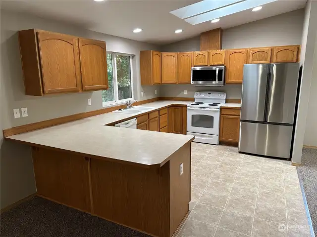 Kitchen open to family room and living room