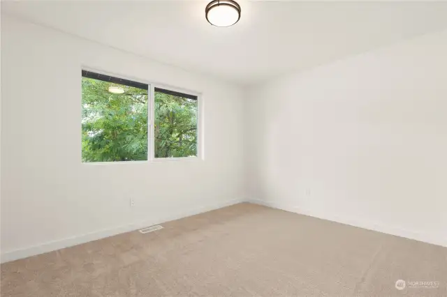 One of two generous sized kids bedrooms upstairs