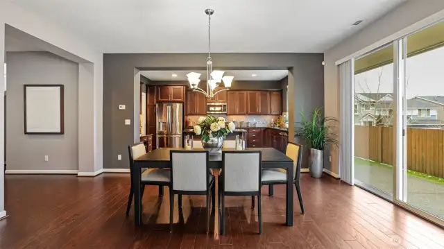 A different view of the dining room then into the kitchen.