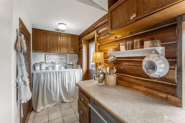 Straight ahead is the laundry area and to the left is the walk-in pantry.