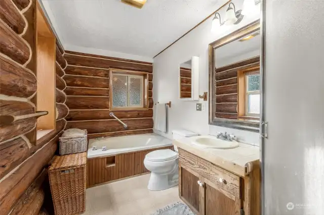 Keeping the rustic theme throughout this 5 piece bathroom