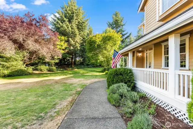 mature front yard landscape offering peace and privacy