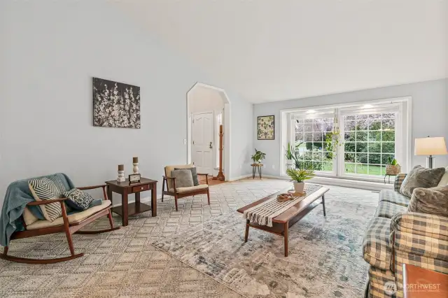 Living room to the left as you enter with large front windows filling the room with sunlight