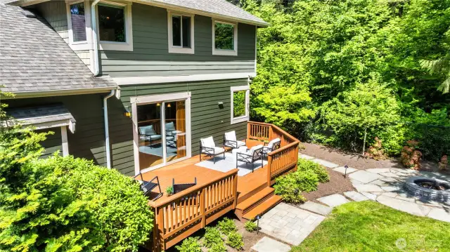 Expansive sunny deck beckons you to linger outside!