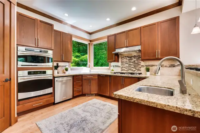 The kitchen boasts a very large pantry and stainless appliances.