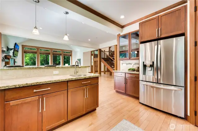 Seamless flowing floorplan allows the chef to mingle with friend and family.