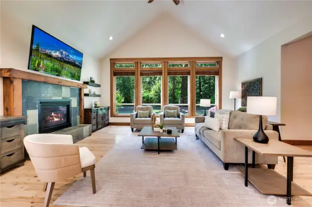 Roaring slate- surround gas fireplace for cozy moments. This great room is truly a haven.