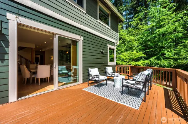 The expansive deck blends the inside/outside vibe this home enjoys.