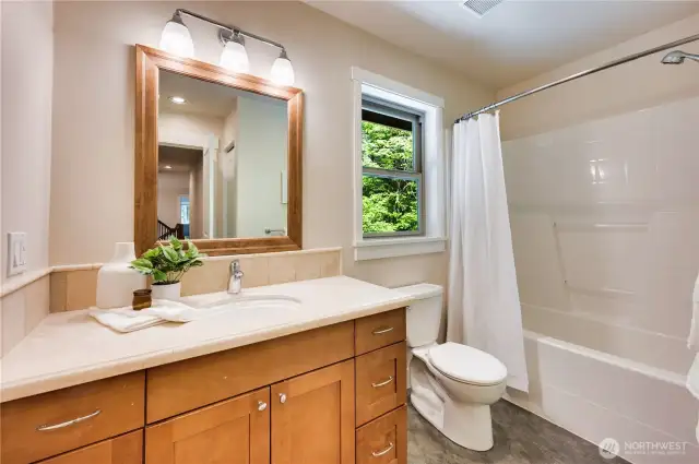 There are 3 full bathrooms upstairs.
