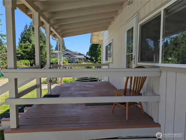 Relax on your covered porch. At this rare opportunity to own acreage on Tumwater Hill. #1003 Irving St.