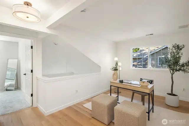 The fantastic upstairs loft offers the perfect space for a home office, creative studio, or versatile flex area to suit your lifestyle.