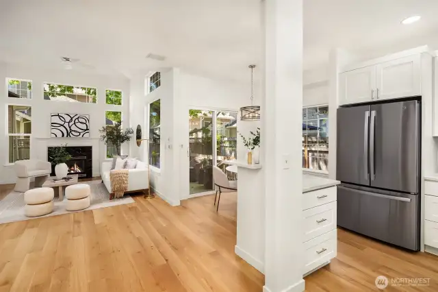 Step inside to light and bright spaces featuring gorgeous new luxury vinyl flooring, soaring vaulted ceilings, abundant windows, and an open, airy layout.