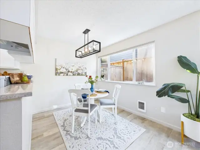 The main floor has laminate flooring throughout.