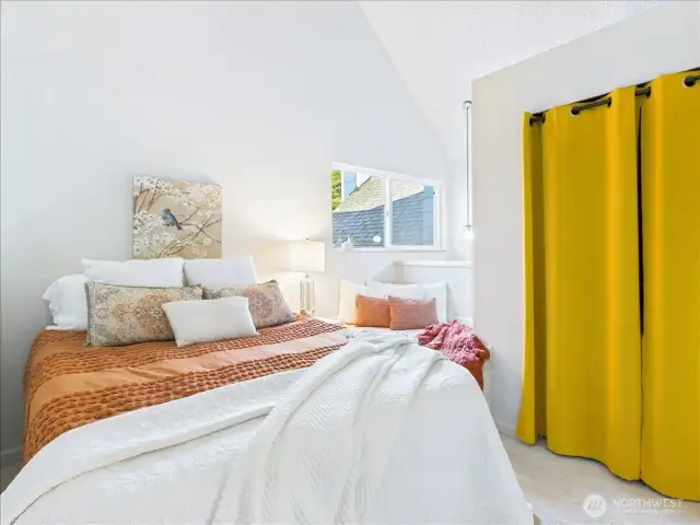 Here staged with a queen bed for scale.