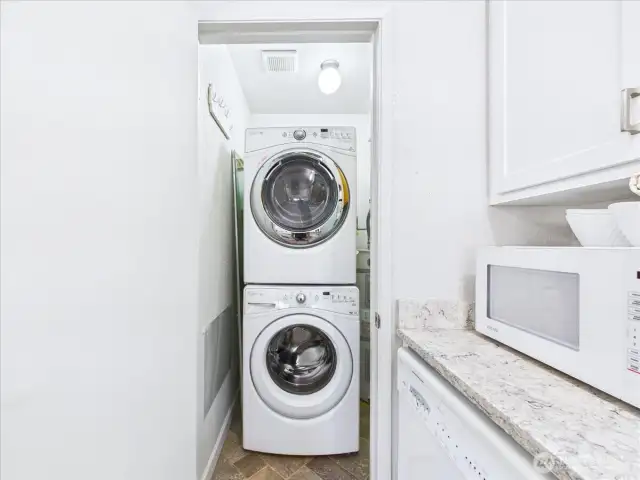 Full size washer and dryer conveys with the home.