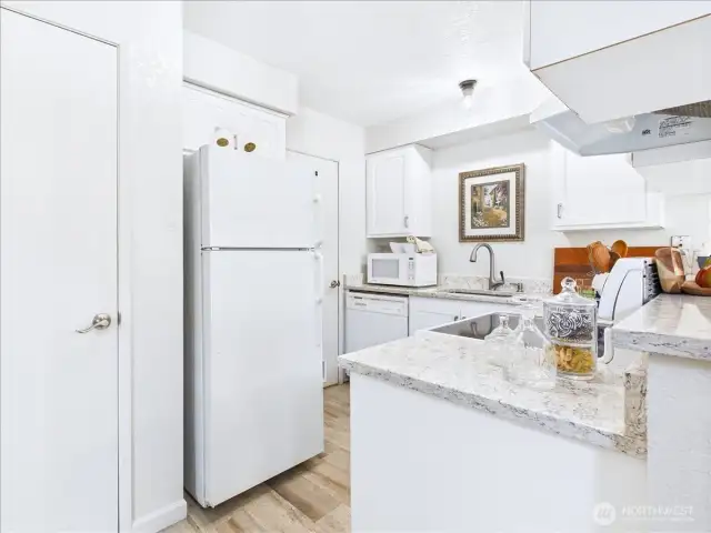 The kitchen has a large pantry for storing all your goodies.