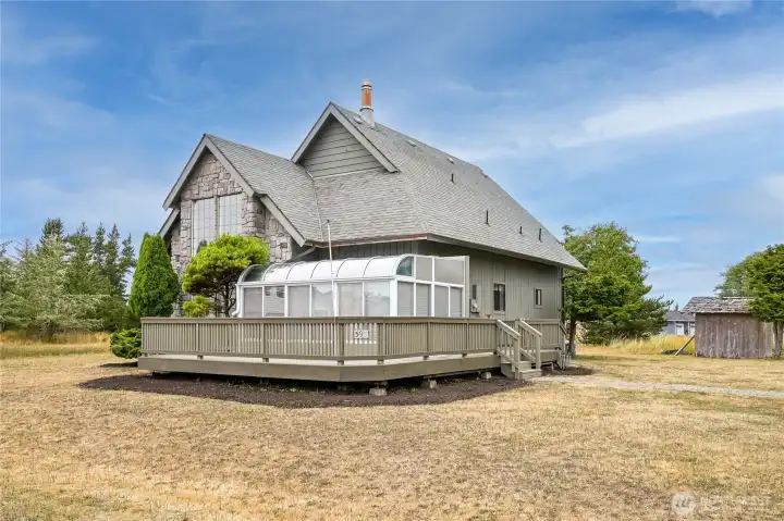 Enjoy the spacious sunroom, located off the kitchen & dining area.