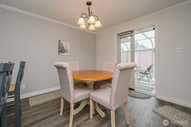 Dining area has access to sunroom & access to the back deck.