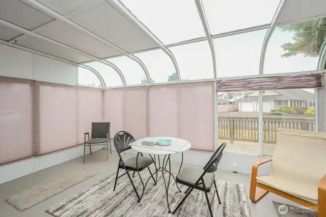 Sunroom acts as a passive solar heating for the interior year round- even in the winter months on sunny days!
